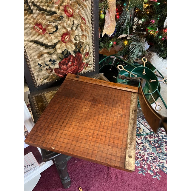 Up for consideration is a beautiful vintage wooden industrial paper cutter with a metal handle. This would look lovely in...