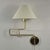 This elegant wall light was designed and manufactured in sweden by armatur hantverk tibro in the 1950s to 1960s. It...