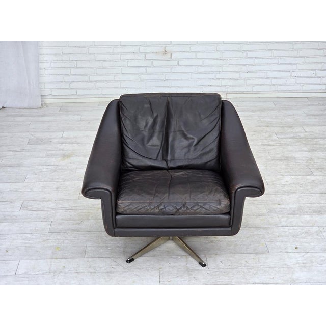 1960s, Danish swivel armchair by Aage Christensen. Original dark brown furniture leather, chromesteel. Original good...