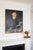 A striking and deeply atmospheric antique oil portrait dated 1903, capturing an elderly woman seated at her writing table,...