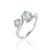 Crafted with fluid curves that wrap around twin gemstones, this ethereal ring brings a sense of soft movement and...