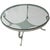 45" glass wrought iron coffee table Torch-cut wrought iron with graceful curves. Glass top. Base is lacquered in off white.