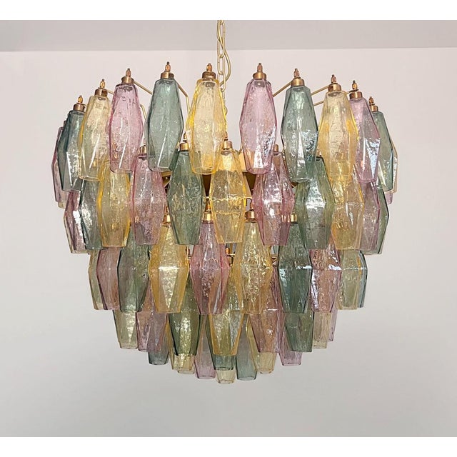 It sounds like you have a stunning piece of art with that Italian pendant light! The combination of 111 multicolored...