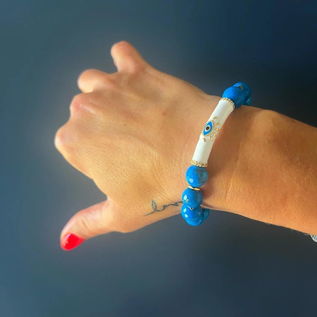 This beautiful handmade bracelet is made with turquoise stone and 18k gold-plated components, making it a stunning piece...