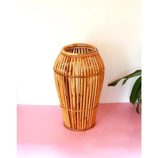 This is a unique mid-century umbrella stand, realised by Italian artisans back in the early 70s. This unique basket is...