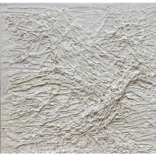 Mixed media: white oil painting, adhesive on canvas (Signed on reverse) Zsolt Berszán treats the first layer of the...