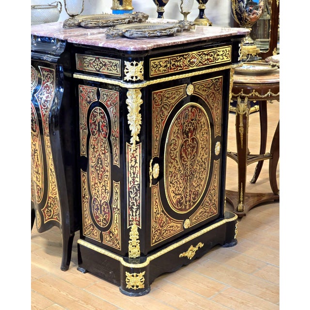Make a dramatic statement with this magnificent Grand Gothic Revival display cabinet, an extraordinary piece that combines...