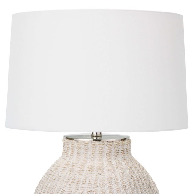 A White-washed natural woven pattern highlights this lamp’s unique body shape. The Hobi’s perfect mix of organic charm and...