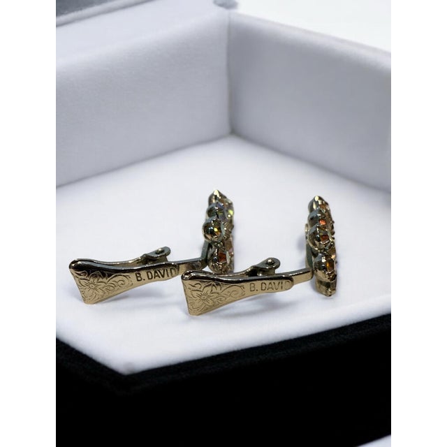 Lovely vintage petite set of B.David Costume Rhinestone Aurora Borealis Earrings Marked on Lever back Clip on Earrings....