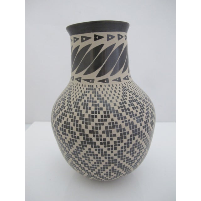 Stunning Mata Ortiz pottery vase. Black on white intricate geometric "eye-dazzler" grid or maze-like design. Measures 4" x...