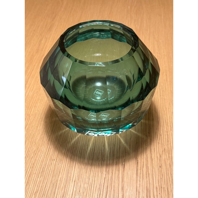 Designed by Istanbul-based Feleksan Onar and a Neue Galerie exclusive, this emerald green, mouth-blown, hand-cut and...