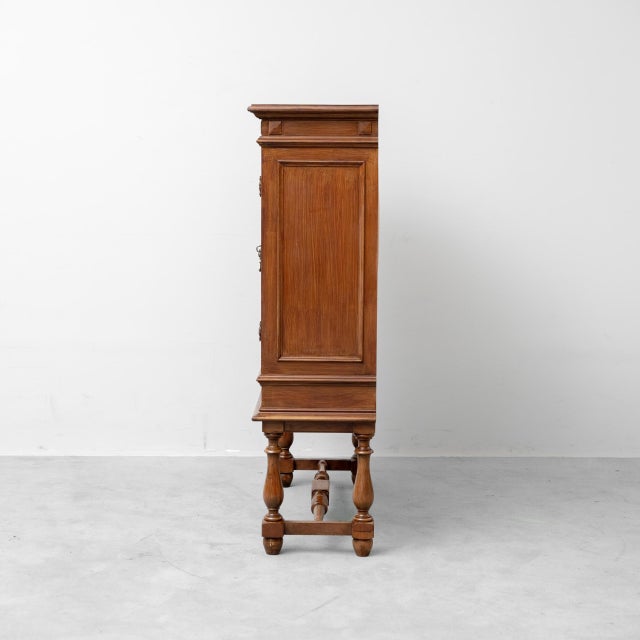 Carved wooden sideboard. Brown. 2 doors and 2 drawers. Excellent condition. Minor signs of wear, as shown in photos.