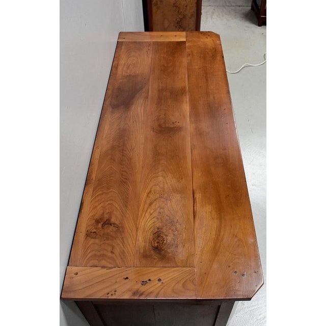 Louis xv style buffet regional cherry, opening with two straight doors and two drawers closing with a key whose facade is...