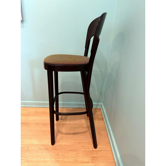 This wooden chair with its elegant form and comfortable feel is almost completely machine-produced, easy to clean and...