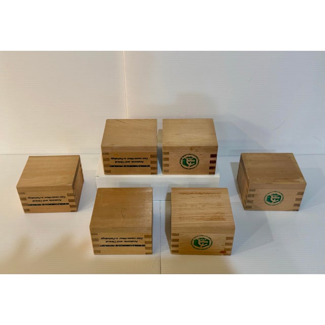 A rare and unusual set of six Japanese wooden masu-style cups created for the XII World Congress of Anatomic & Clinical...