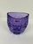 Purple crystal glass vase by Marquis by Waterford featuring a raised geometric pattern with circular and curved designs....