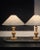 a matched pair of vintage swedish pine table lamps from the 1960s. softly sculptural turned wood bases, finished with a...