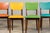 A playful and one-of-a-kind set of six 1960s French mid-century modern dining chairs, sourced from Provence, France. Each...