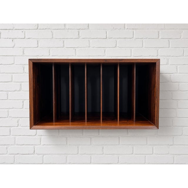 The lp record cabinet by poul cadovius for cado in the 1960s is a vintage retro piece made from rosewood, originating from...