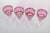 Set of four Bohemian wine glasses. Pink crystal glasses with cut and etched decoration in the classic Bohemian style. The...