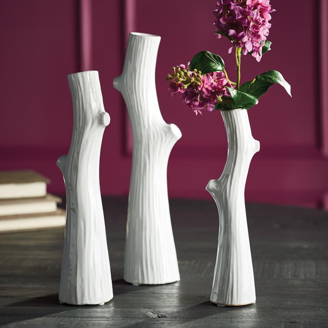 A trio of delicate faux bois stoneware vases are the perfect little accent for shelf or desk. Add some permanent blooms or...