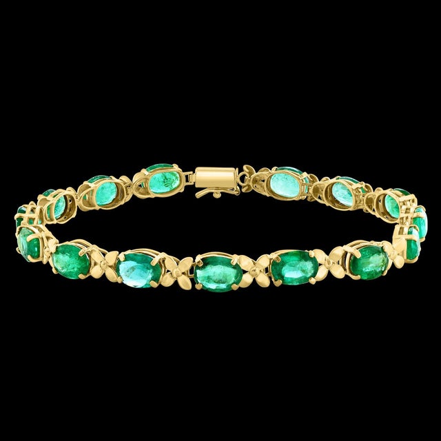 This exceptionally affordable Tennis bracelet has 15 stones of oval Emeralds . Total weight of the Emeralds is...