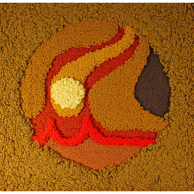 A 1976 wool tapestry by the American artist Harry Hilson (1935-2004). This work features a central circle biomorphic...