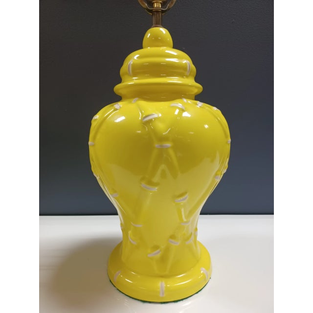 Vintage pair of ceramic yellow ginger jar faux bamboo accent lamps. Shade of yellow is vibrant.