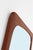 1960s Danish wall mirror. Restored solid teak frame. High-quality craftsmanship. Dimensions: approx. 63 x 36 x 1 cm...