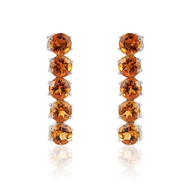 This elegant jewelry set features 64.78 ct natural round citrine gemstones, beautifully prong set in 925 sterling silver....
