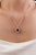 This Classic Halo Pendant showcase 2.78-carat natural blue sapphire, set in 14k white gold. The measuring 10 x 7.5 mm,...