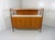 Highboard by Deutsche Werkstatten, Germany. (marked) Teak wood with white laminated tops. Under the upper top 4 small...