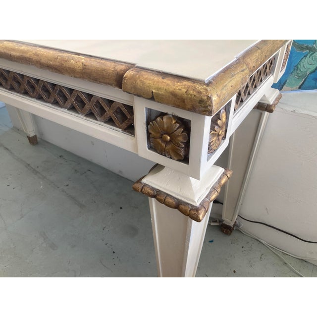 Incredibel Vintage Michael Taylor French Style Console in Gilt and painted Ivory Finish. Beautiful finish combination....