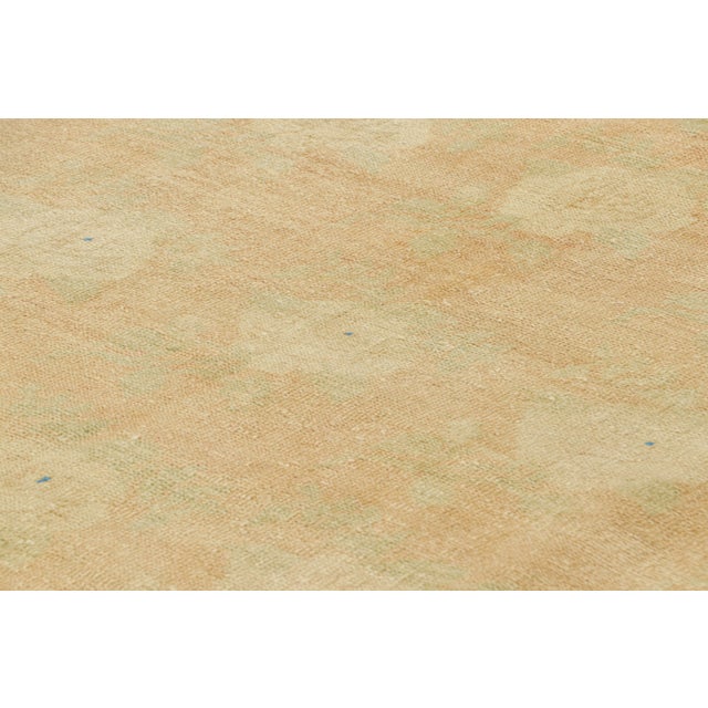 Hand-knotted in wool and originating from Turkey circa 1960 – 1970, this 5x9 vintage Zeki Müren rug is a unique addition...