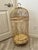 Beautiful oversized birdcage, featuring an ornate domed top and bottom. Intricate scrollwork detailing with a distressed...