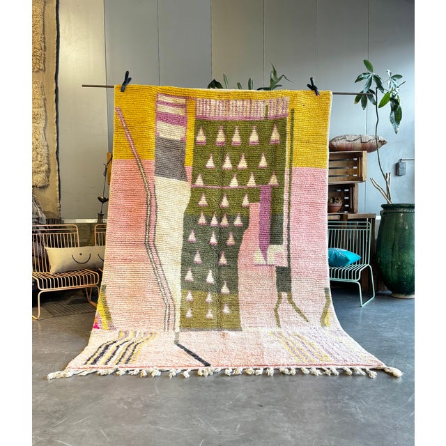 This authentic Moroccan Boujad Berber rug was handwoven in the Middle Atlas region using high-quality natural wool. Boujad...