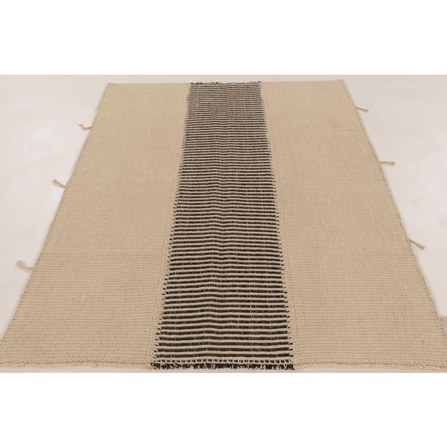 Handwoven in wool, this 7x5 contemporary kilim is a sophisticated addition to Rug & Kilim’s curation. This brand-new piece...