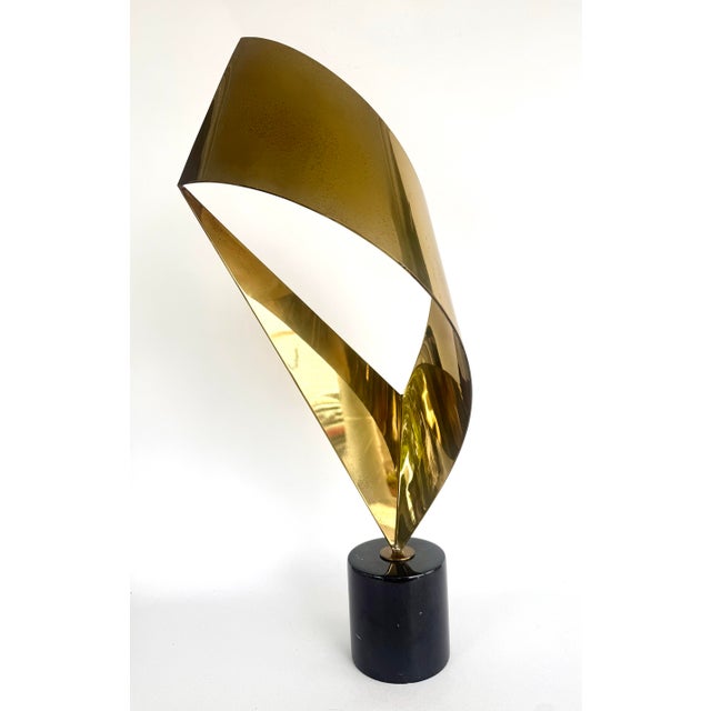 Vintage 1980's Curtis Jere Brass Ribbon Sculpture on a Marble Base . Substantial construction, not signed.