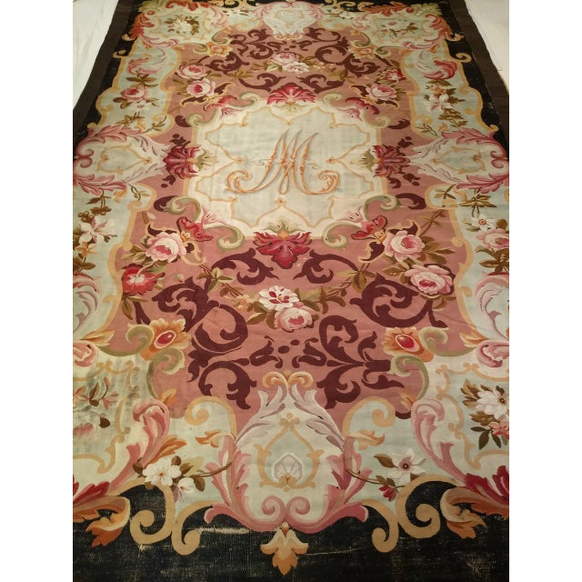 This late 19th-century French Aubusson rug is a masterclass in romantic color and classical design. The eight-lobed...