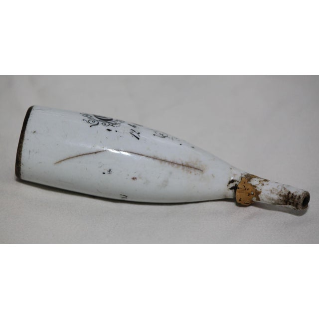 This antique pipe bowl belonged to a soldier named Georg Daube. The style of writing and shape of the bowl would indicate...