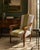 An elegant and beautifully reupholstered arm chair attributed to Baker Furniture’s Milling Road collection, blending...