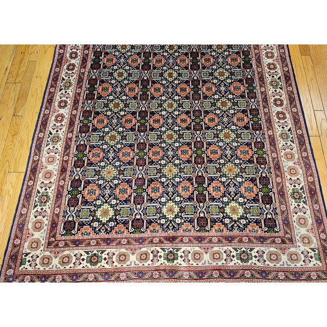 "A rare and highly collectible vintage Persian Tabriz rug showcasing an extraordinary allover Afshan geometric pattern,...