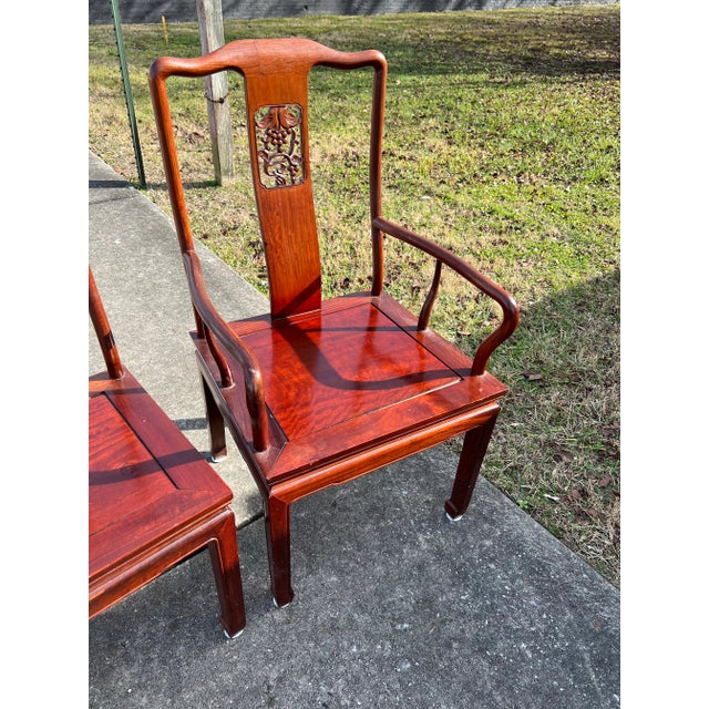 Four Stunning Rosewood Chairs in an Asian Style Motif with Three Side Chairs and a Captains Chair .