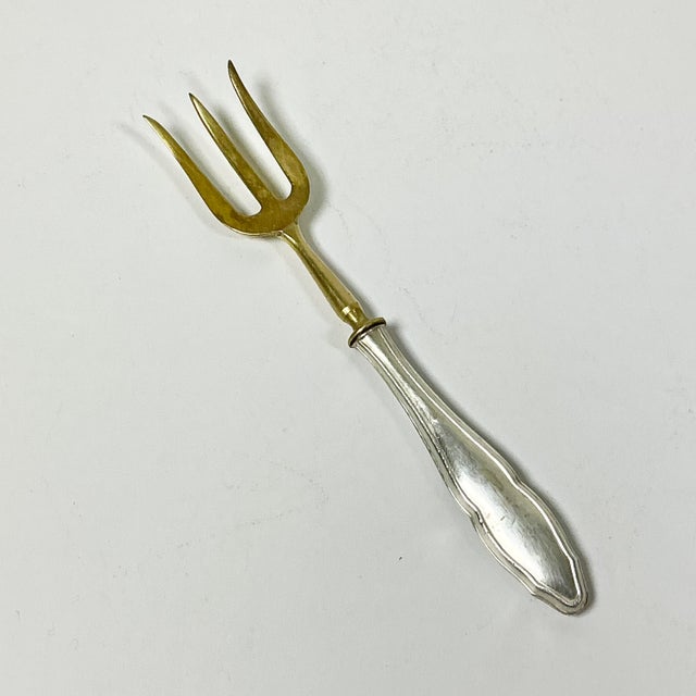 What a great little serving fork that can be used with so many different foods. It features a Brass fork with a hollow...