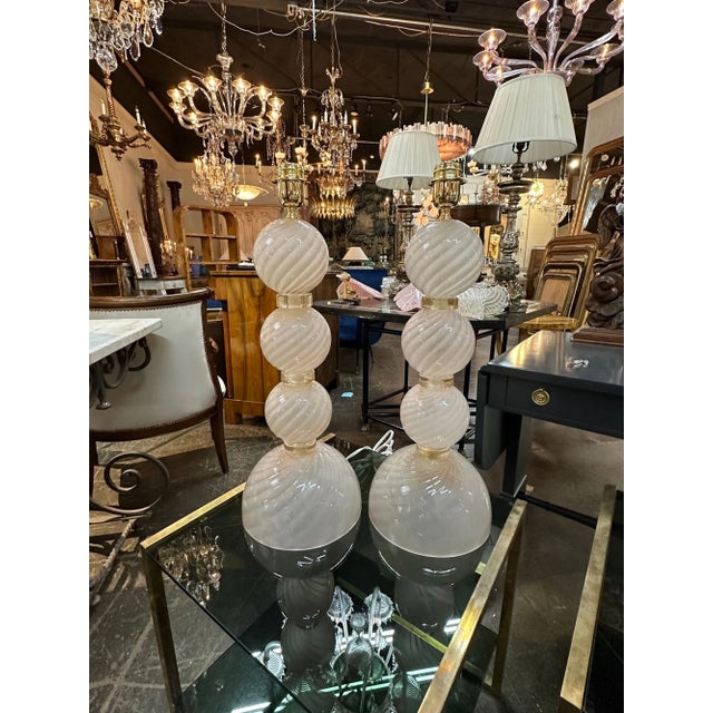 Nice pair of modern Murano pink opalescent glass ball form lamps. Circa 2000. A favorite of top designers!