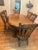 Beautifully crafted solid oak dining table was made in the USA in the 1970s and offers both classic style and exceptional...