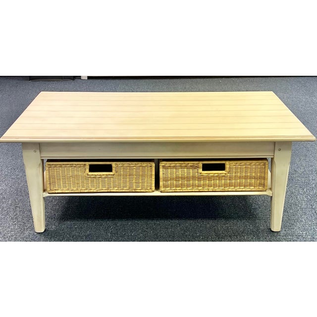 Great farmhouse style coffee table by Lane from their Eddie Bauer Lifestyles collection. Features a plank style top with...
