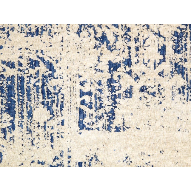 The Modern Collection explores hand-tufted design through abstract patterning, solid tonal fields, and subtle surface...