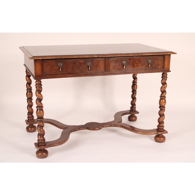 Louis XIV style mahogany writing table, made by Alfonso Marina, circa 2008. With an inset flame mahogany top with...