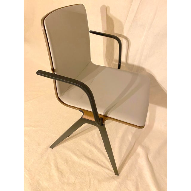 Sculptural and ergonomic, this modern statement piece from the design studio of jehs+laub was manufactured under license...